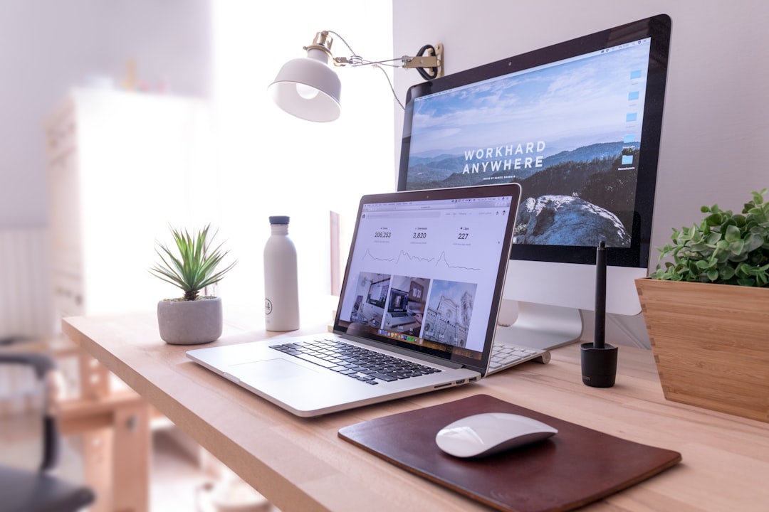 Unsplash Power by Best 3D Printer MacBook Pro on table beside white iMac and Magic Mouse